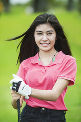 lady playing golf