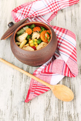 Baked mixed vegetable with chicken breast in pot,