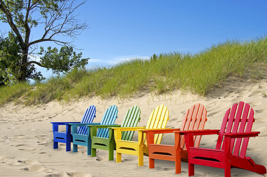 row of colorful beach chairs