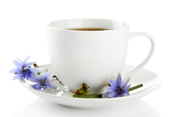 Cup of tea with chicory, isolated on white