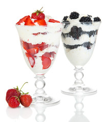 Natural yogurt with fresh berries isolated on white