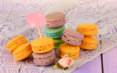 Macaroons on wooden table close-up