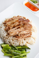 Pork leg with rice on white background