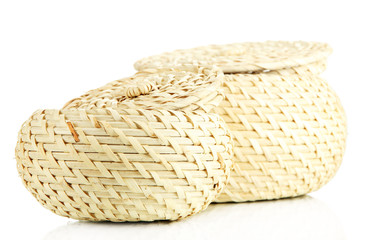Two wicker baskets with covers, isolated on white