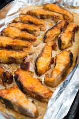Fried sturgeon fillets on aluminium foil