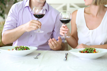 Beautiful couple having  romantic dinner at restaurant