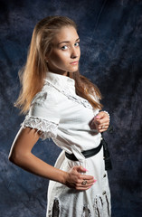 Portrait of a beautiful young woman looking at the camera