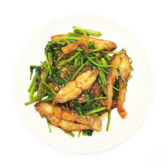 Fried crisp fish with coriander on plate