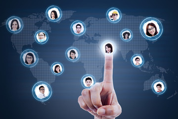 Close-up finger clicking social network on blue