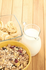 Delicious and healthy cereal in bowl with milk