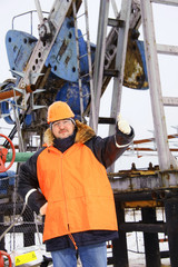 Worker in an oil field.