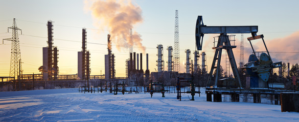 Pump jack and grangemouth refinery.