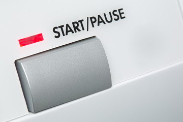 A large start or pause button