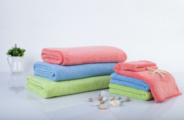 Obraz na płótnie Canvas stack of multicolored towels