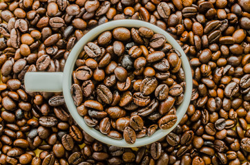 Coffee beans on cup
