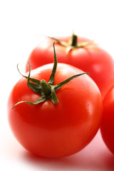 Tomatoes on the white background