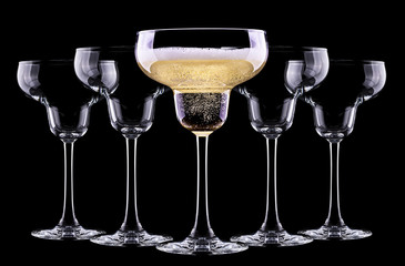 glass of champagne isolated on black background