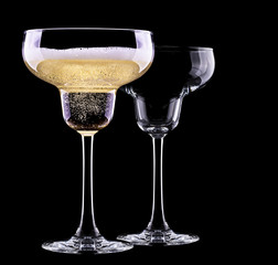 glass of champagne isolated on black background