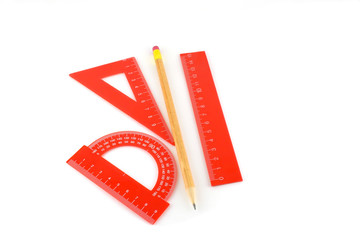Triangle, protractor, ruler and pencil