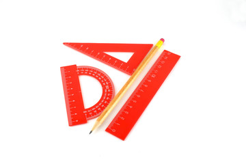 Triangle, protractor, ruler and pencil