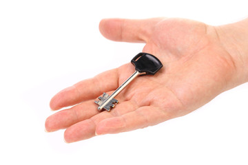 Hand holds modern steel-plastic key.