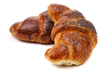 Image of croissant with poppy.