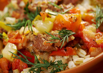 boiled pearl barley with meat and vegetable
