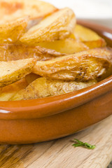 Potato Wedges - Crispy potato wedges served with aioli.
