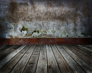 old wood floor and concrete wall