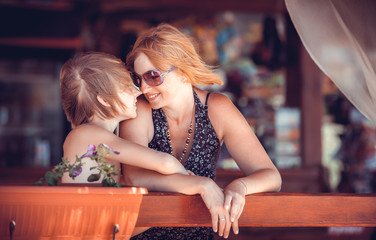 family in cafe at sea