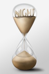 Hourglass with Night made of sand. Concept of passing time