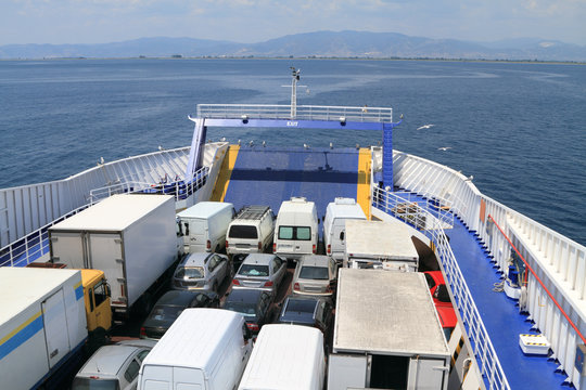 ferry boat loaded with cars and trucks