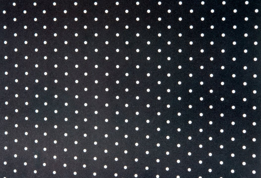 Black and white dots fabric background