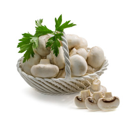 Champignons in a basket on a white background