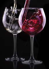 Elegant red wine glass in black background