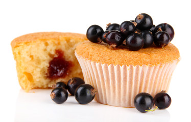 Tasty muffins with berries isolated on white