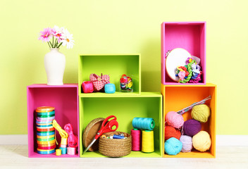 Colorful shelves of different colors with utensils