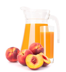 Peach fruit juice in glass jug