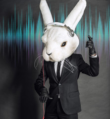 Rabbit Dj  in balck suit on dark background - 54867574