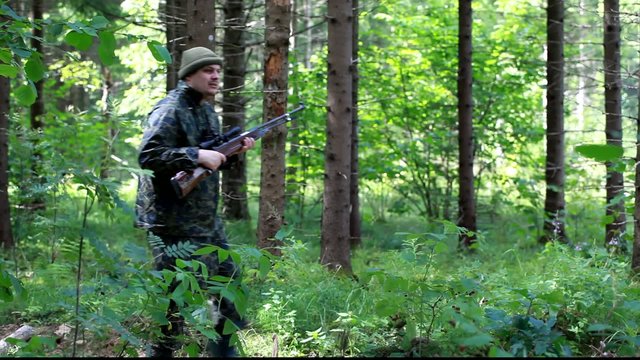 Man with optical rifle and binoculars in the woods episode 8
