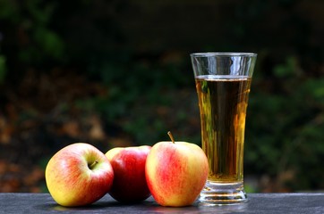apples and glass of juice
