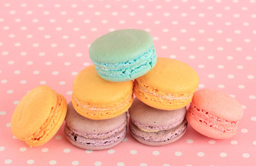 Gentle macaroons on pink background