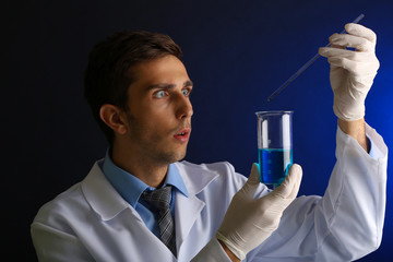 Young laboratory scientist working at lab