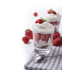 Strawberry parfait on white background with spoon
