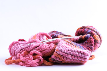 Colourful wool knitting needles in focus