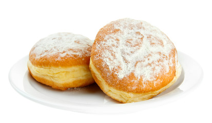 Obraz na płótnie Canvas Tasty donuts on plate, isolated on white