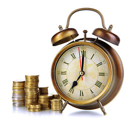 Antique clock and coins isolated on white