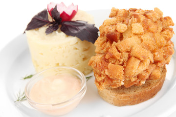 Chicken Kiev  and mashed potatoes on plate, isolated on white