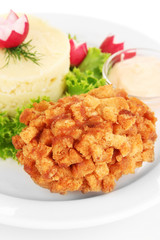 Chicken Kiev on croutons with mashed potatoes, isolated on
