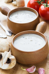 Mushroom soup in clay pots